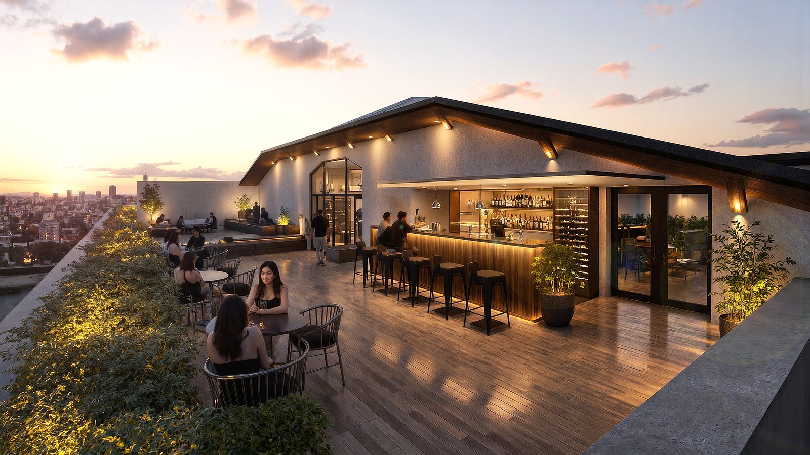 Rooftop de Mercado Colón con barra y terraza al atardecer